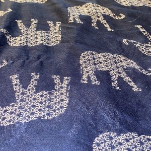 Navy blue infinity elephant scarf with trimming alone the edge
